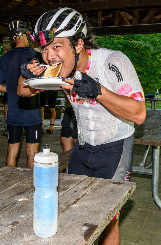 Rider eating pancakes at the aid station