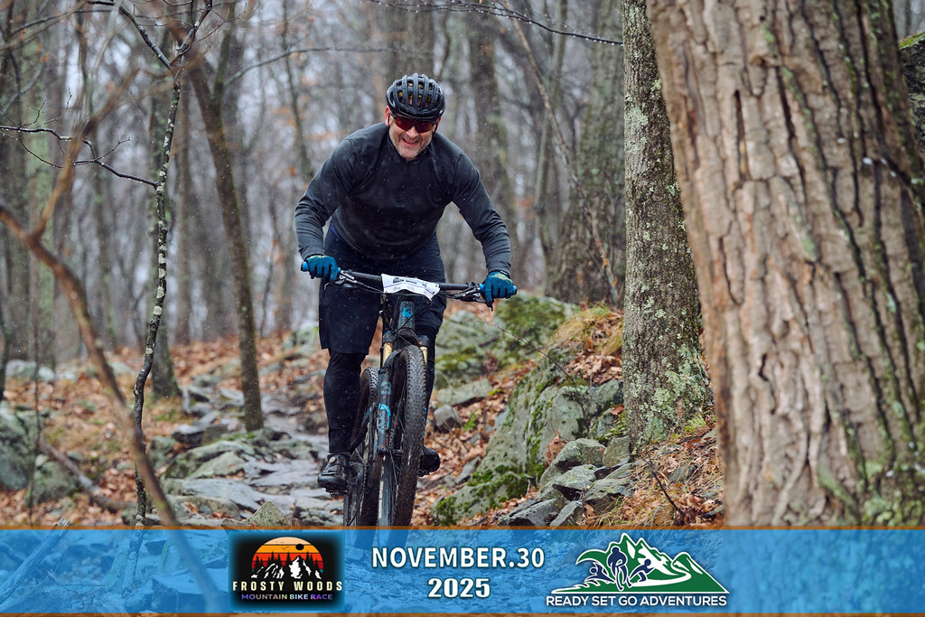Smiling mountain biker on Frosty Woods singletrack